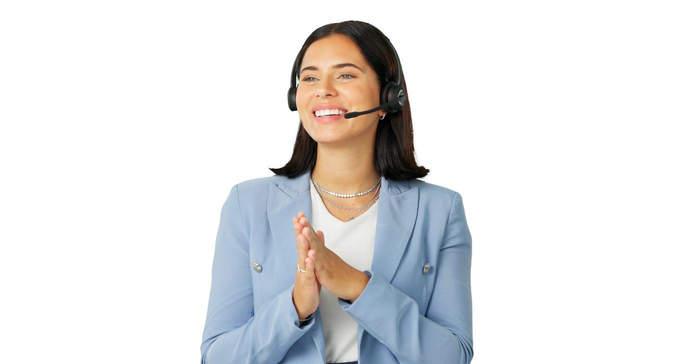 A person wearing a headset and clapping her hands

Description automatically generated