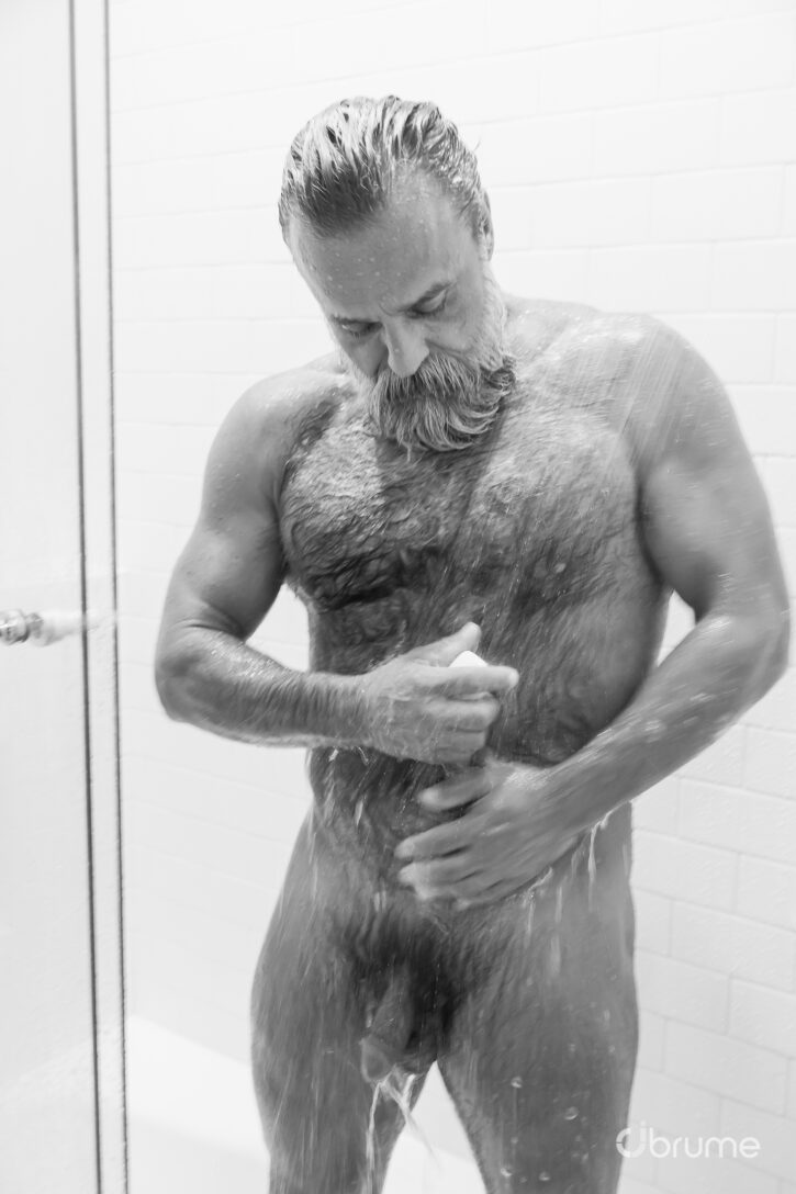 Daddy John creating gay xxx onlyfans and justfor.fans content naked covered in water and soap in the shower