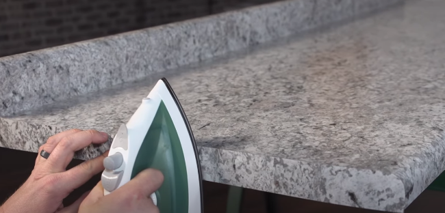 laminate countertop end cap - Start at the center of the end cap and use the iron to apply heat and pressure