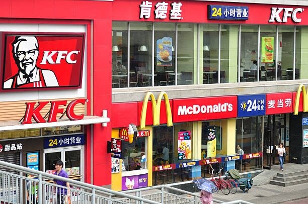 fast food restaurants (KFC and McDonalds) next to each other