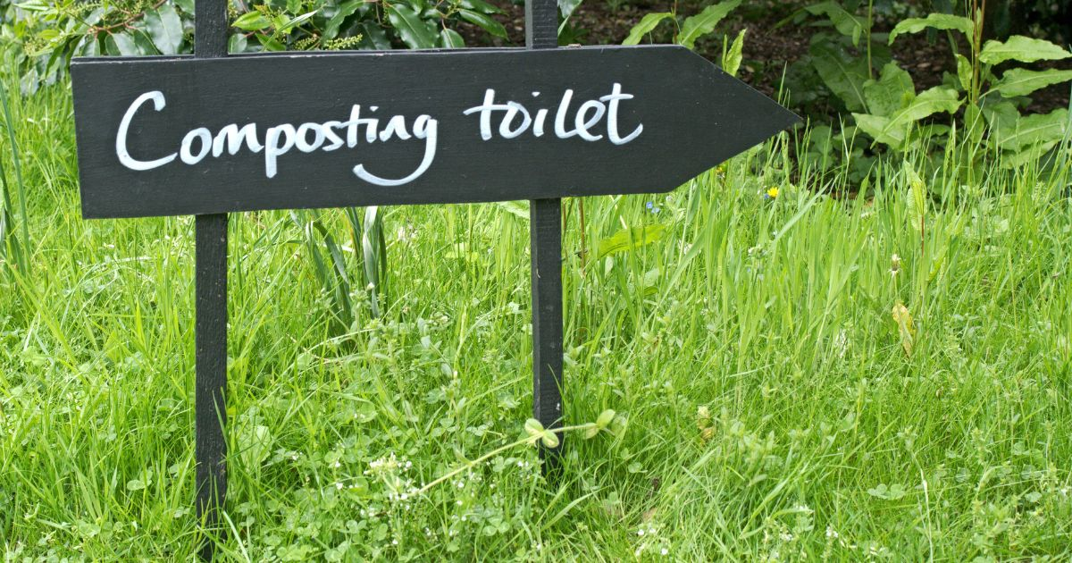Sign that Reads "Composting Toilet"