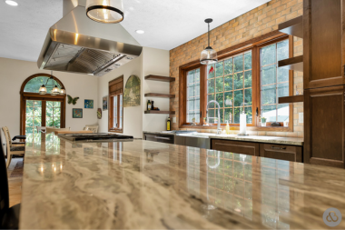 granite countertop in kitchen remodeling project with range and lighting custom built michigan