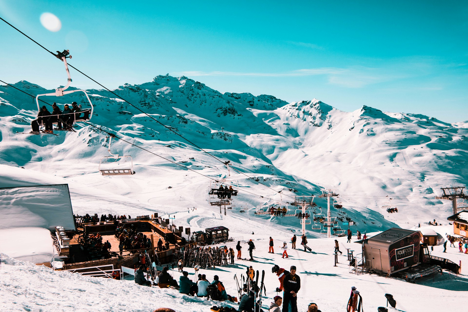 a crowd of skiers on a snowy mountain