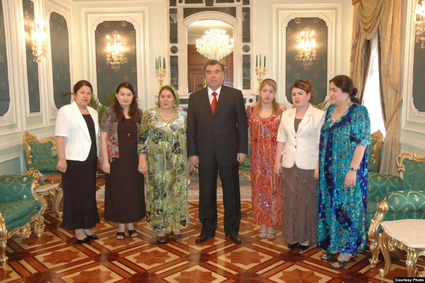 Tajik President Emomali Rahmon (center) stands with family members in an undated photo. His fifth daughter, Sifat Pharma owner Parvina Rahmonova, stands second from the right.