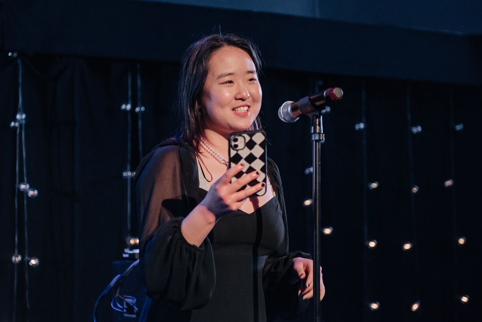 FutureVerse student, Kyo Lee performs a reading at the Cabaret. 