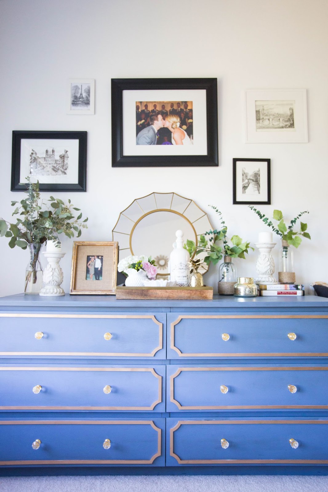 blue and gold malm dresser with clear pulls. 