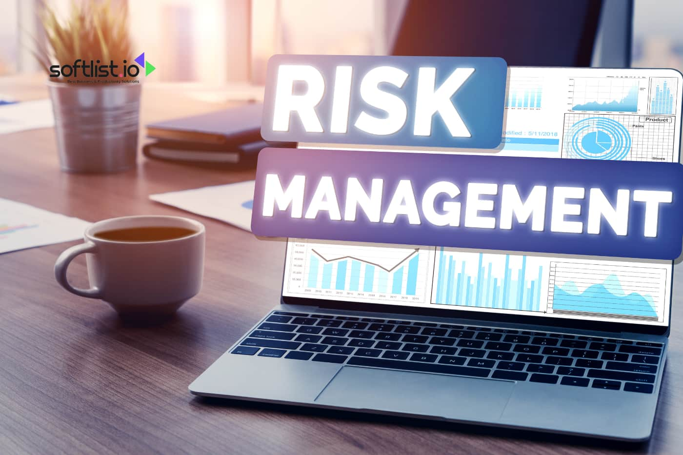 Risk management text on a laptop