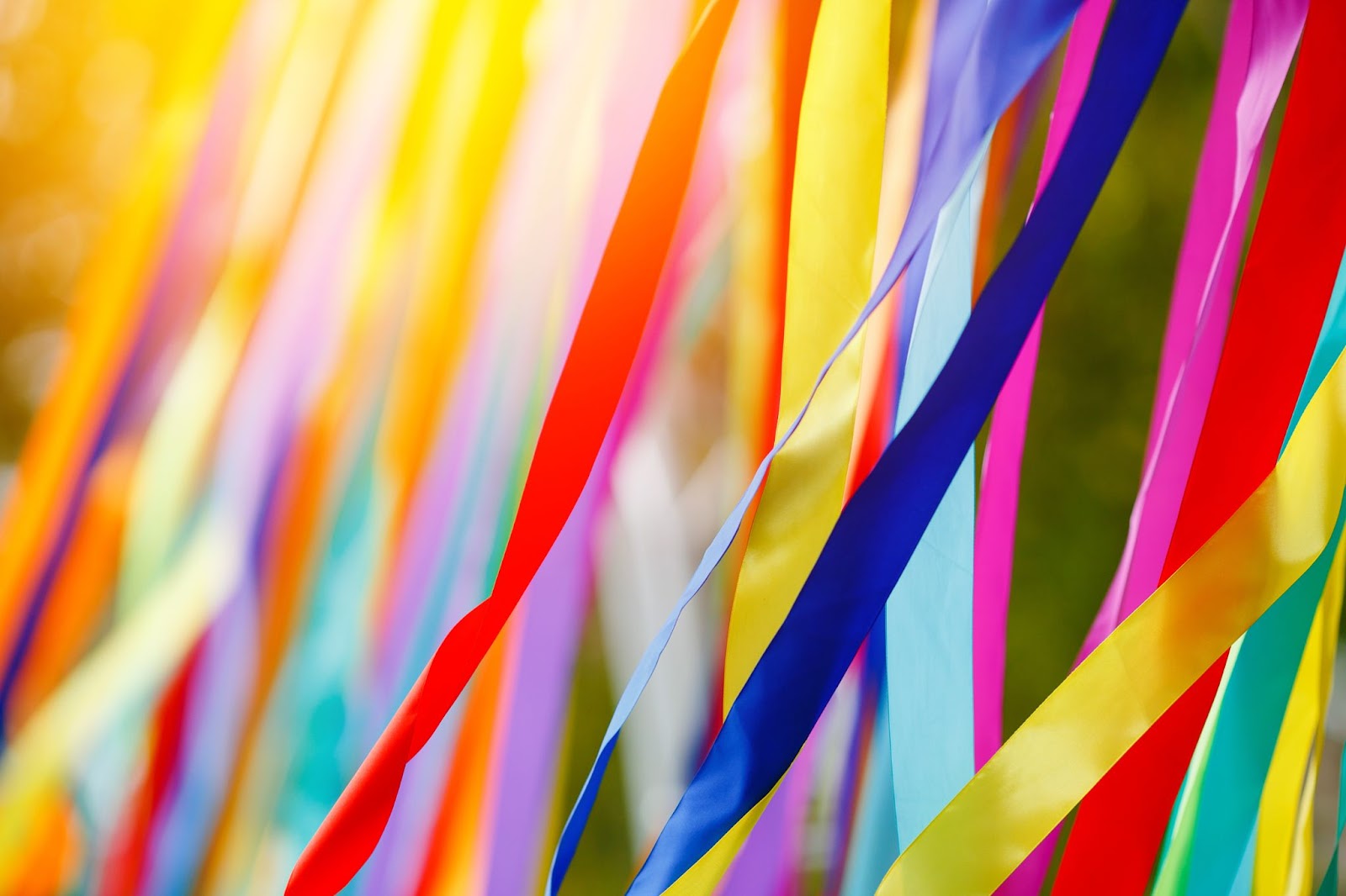 Multi-coloured medal ribbons floating in the wind.
