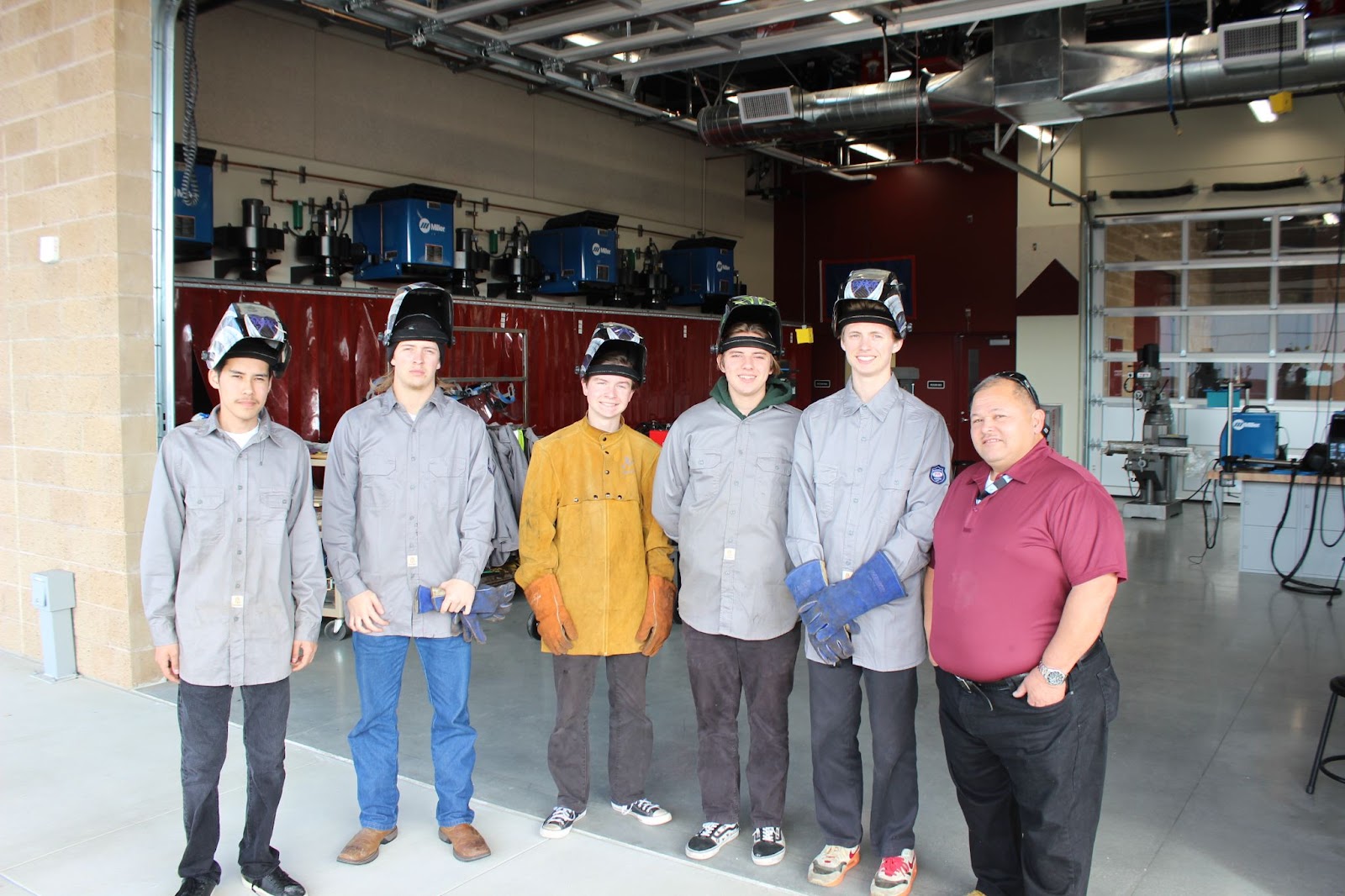 A Group of Students with Wielder helmets on Their Heads.