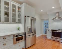 Appliance enclosures installed in a kitchen