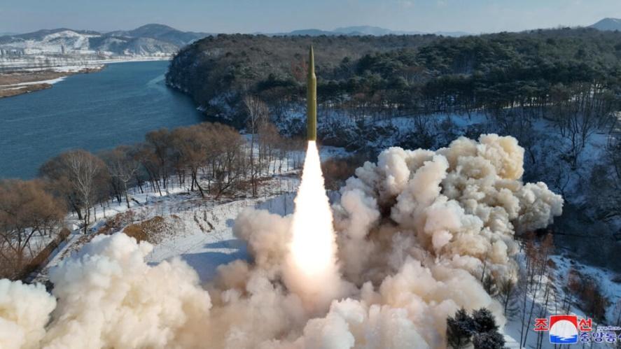 Ballistic missile, said to be solid-fuel and hypersonic, launches during a test at an unspecified location in North Korea in this picture released by the Korean Central News Agency on January 14, 2024