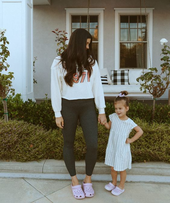 Baby Crocs: Picture  of a mother and her  stylishly dressed baby girl