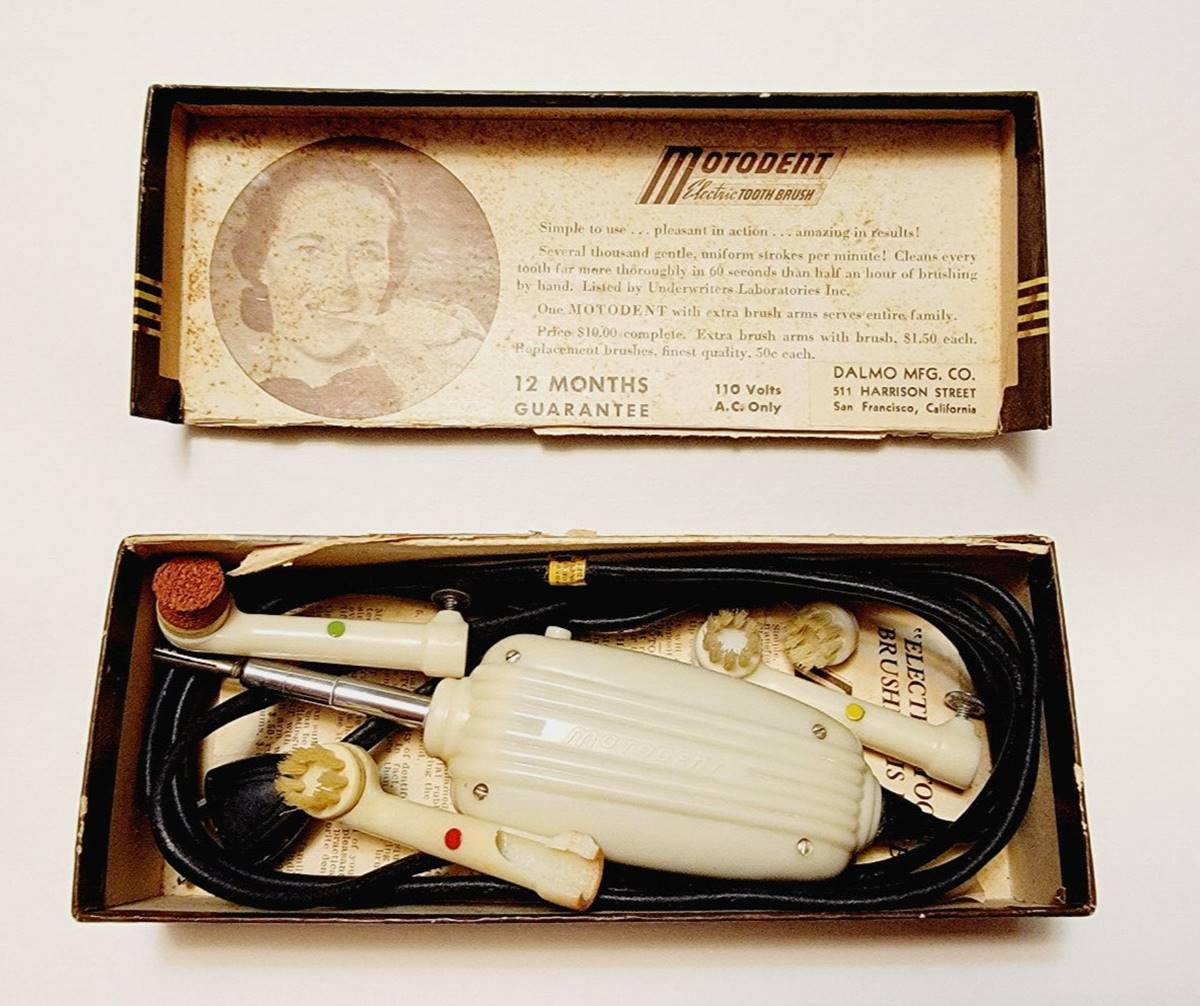 An image showing the first prototype of the electric toothbrush in its case.