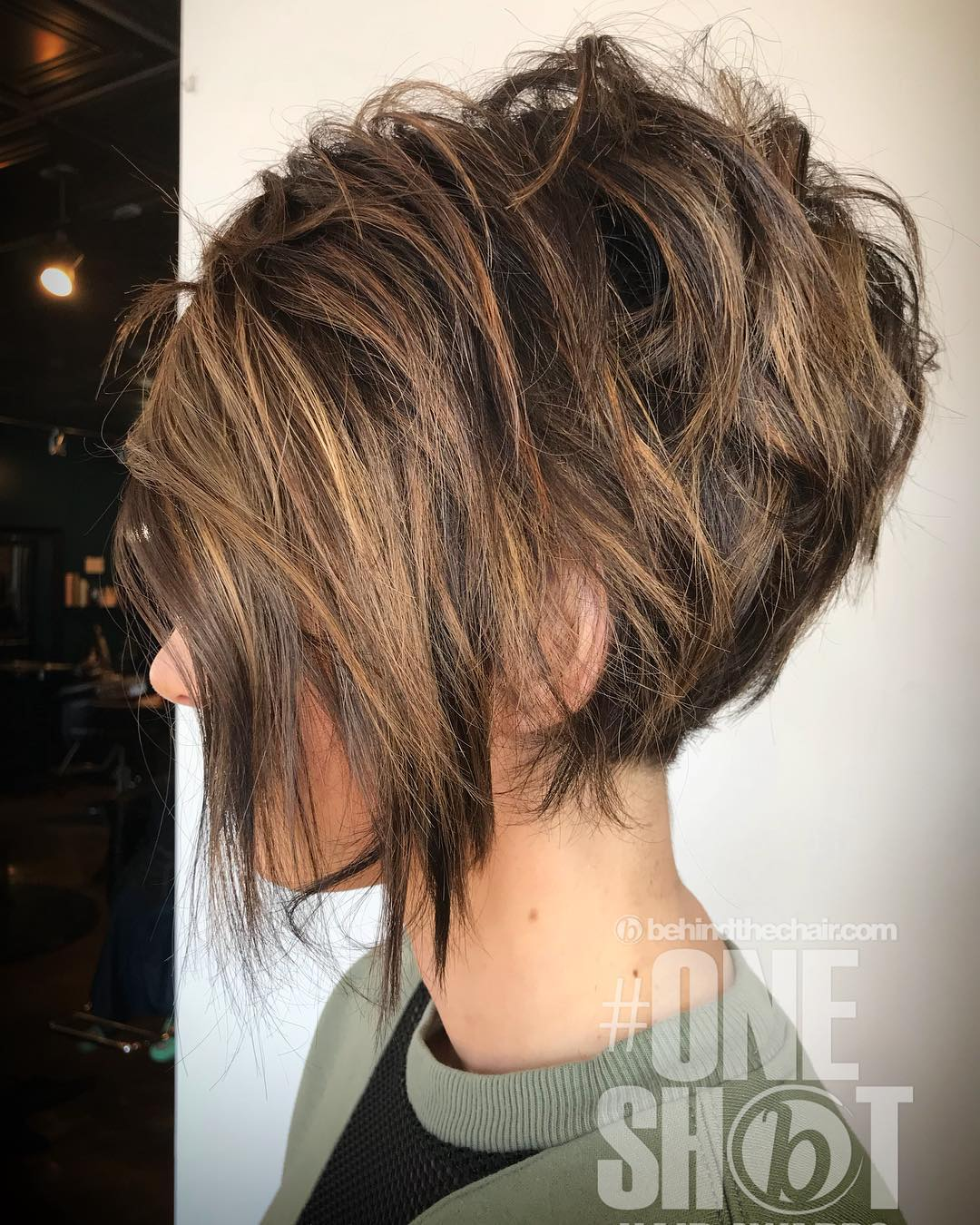 Messy Highlighted Pixie with Long Side Bangs