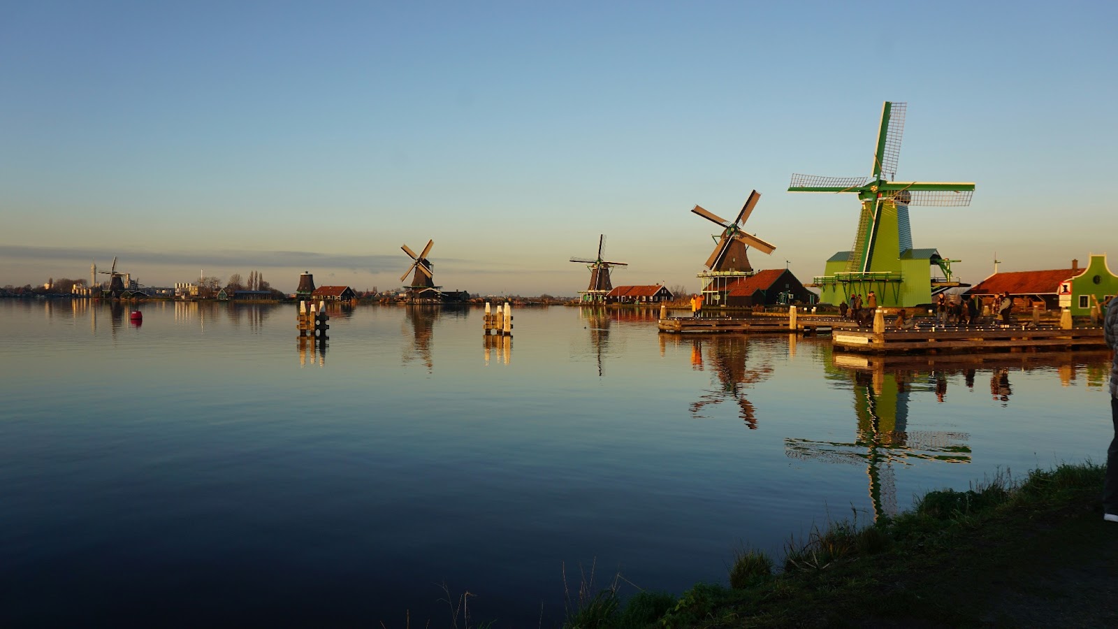 The Dutch windmills reflecting off the water surrounding Amsterdam.