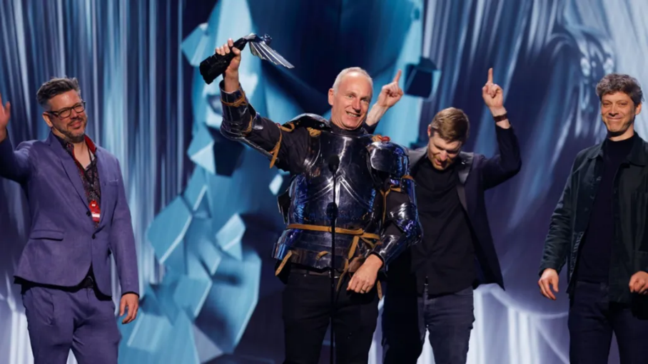 Swen Vincke, the Owner of Larian Studios, hoists the Game of the Year trophy after Baldur's Gate 3 wins big at the Game Awards.