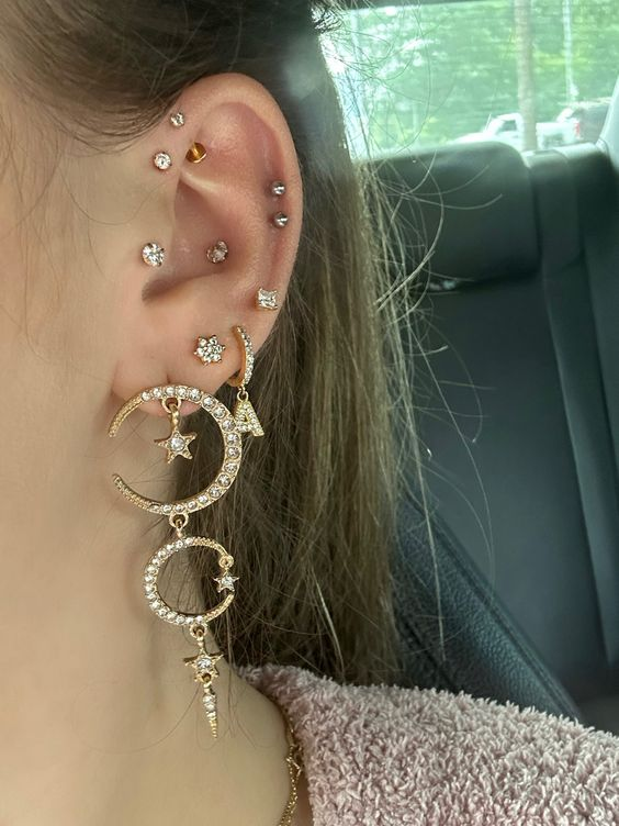 Close up view of a lady rocking the  multiple piercings 