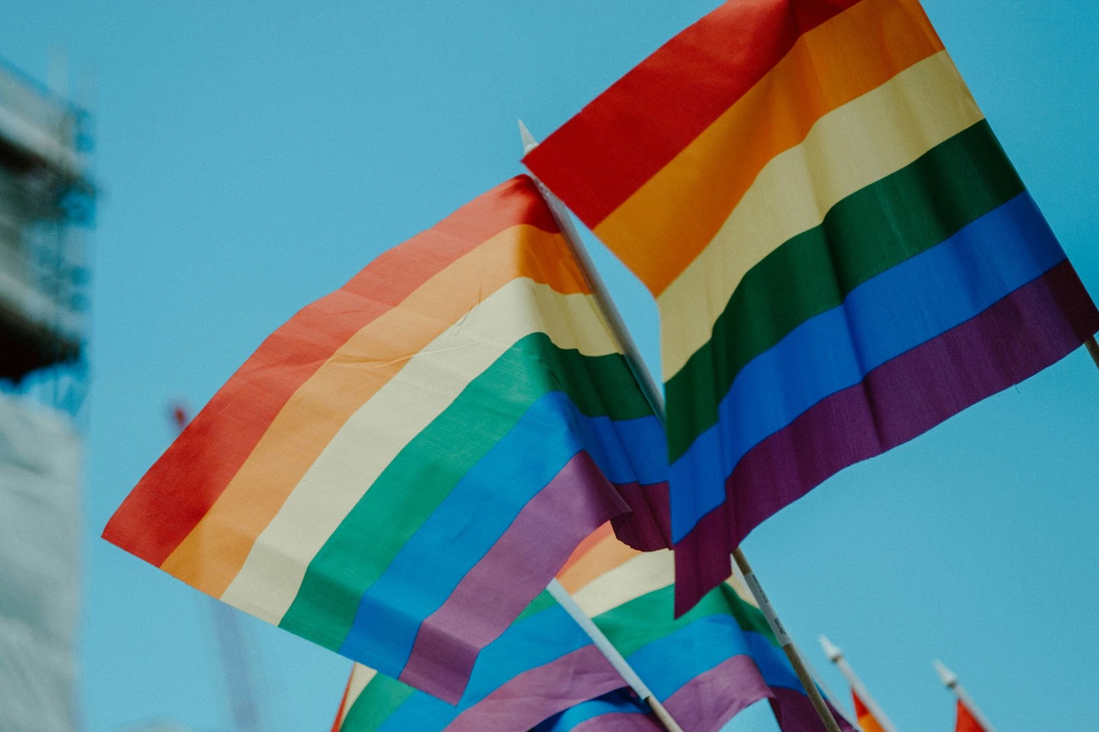 A multicolored flag with different rainbow colors