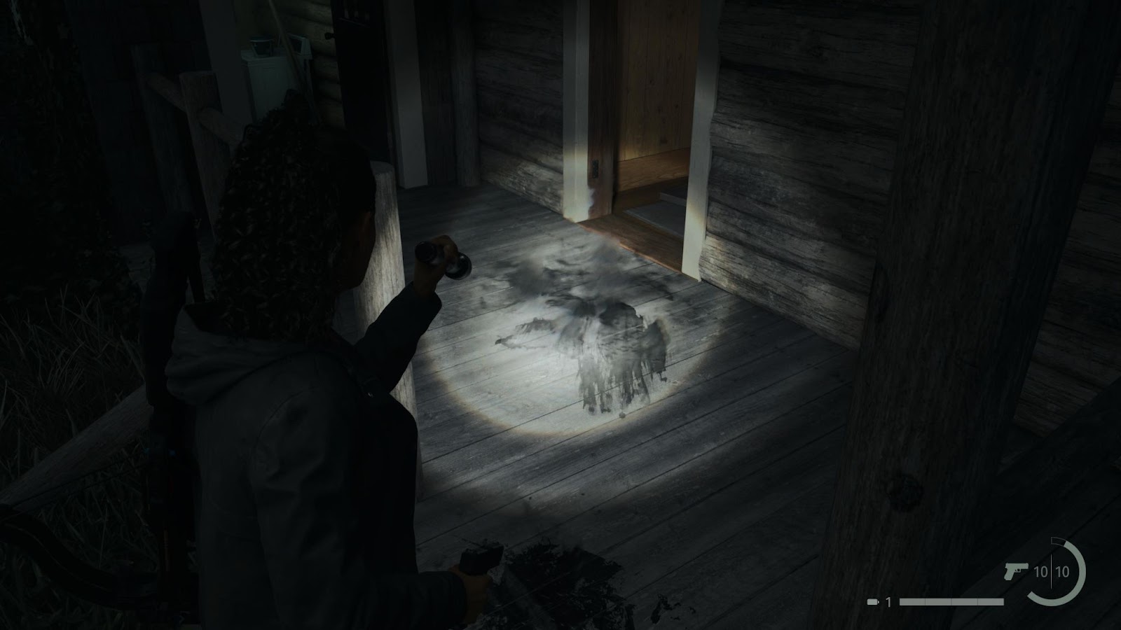 An in game screenshot of the dark trail going into the Ranger Cabin from Alan Wake 2. 