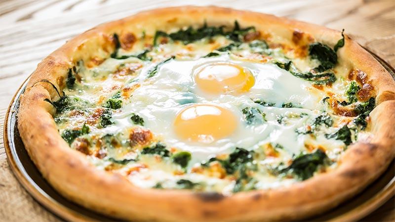 French traditions you might find weird: sunny side up egg on a pizza