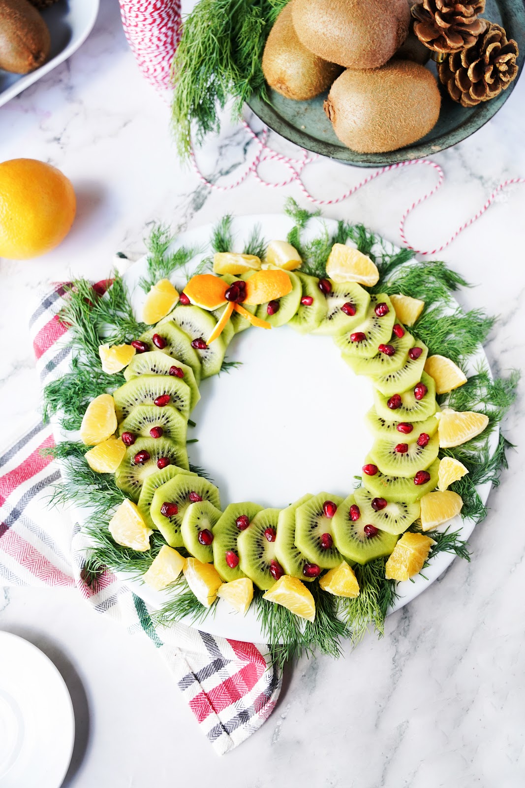 Lay leftover orange segments on the outside of the wreath.
