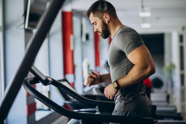 Free photo strong man training in gym