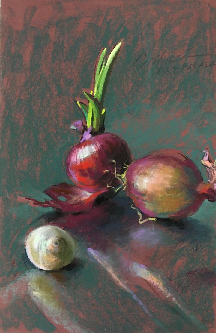 A close-up of onions and a snail

Description automatically generated