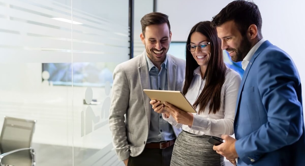 Entrepreneurs looking at a tablet