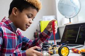 Kid doing Robotics - Adobe Stock