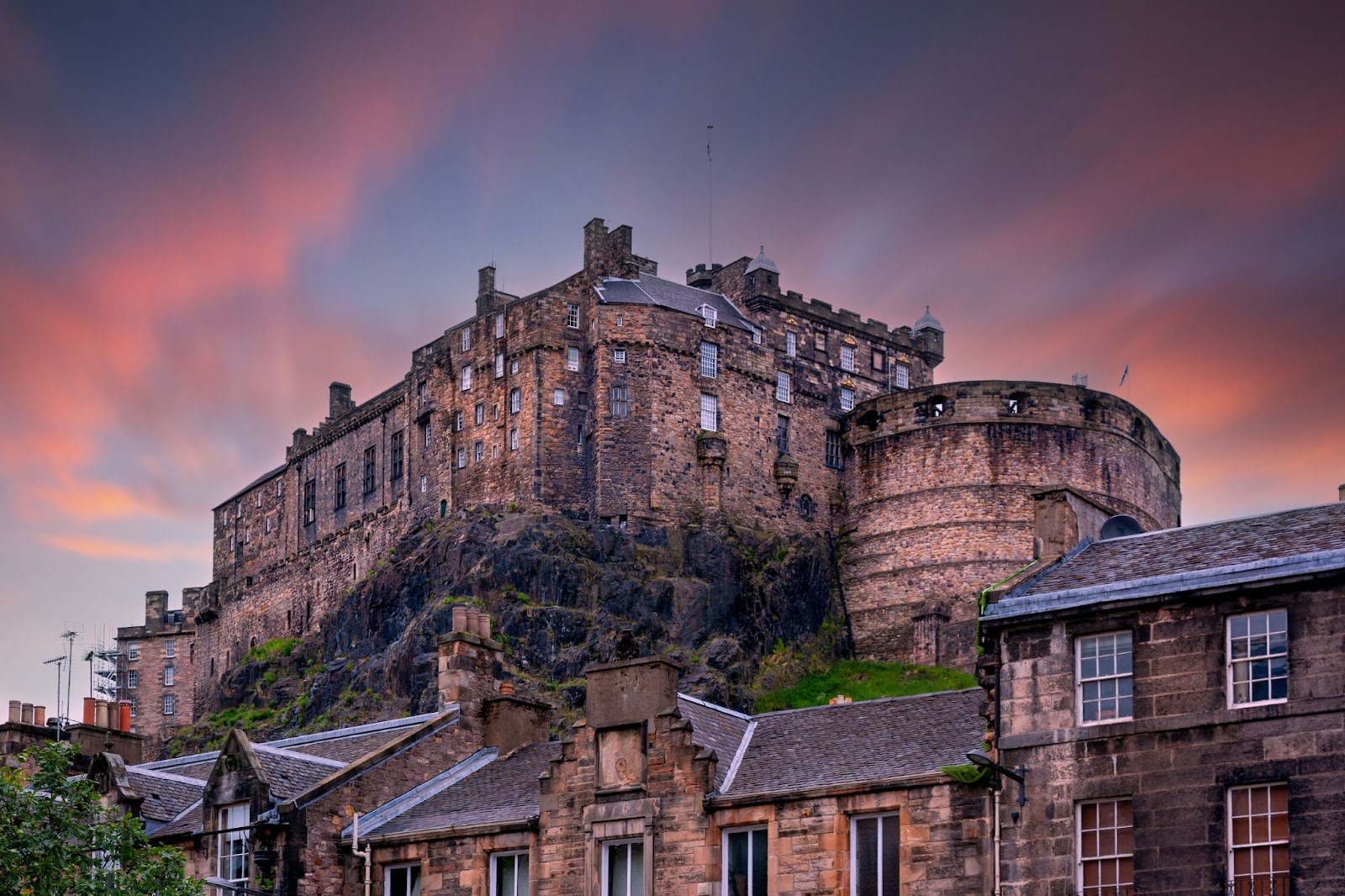 A photo of Edinburgh castle at sunrise