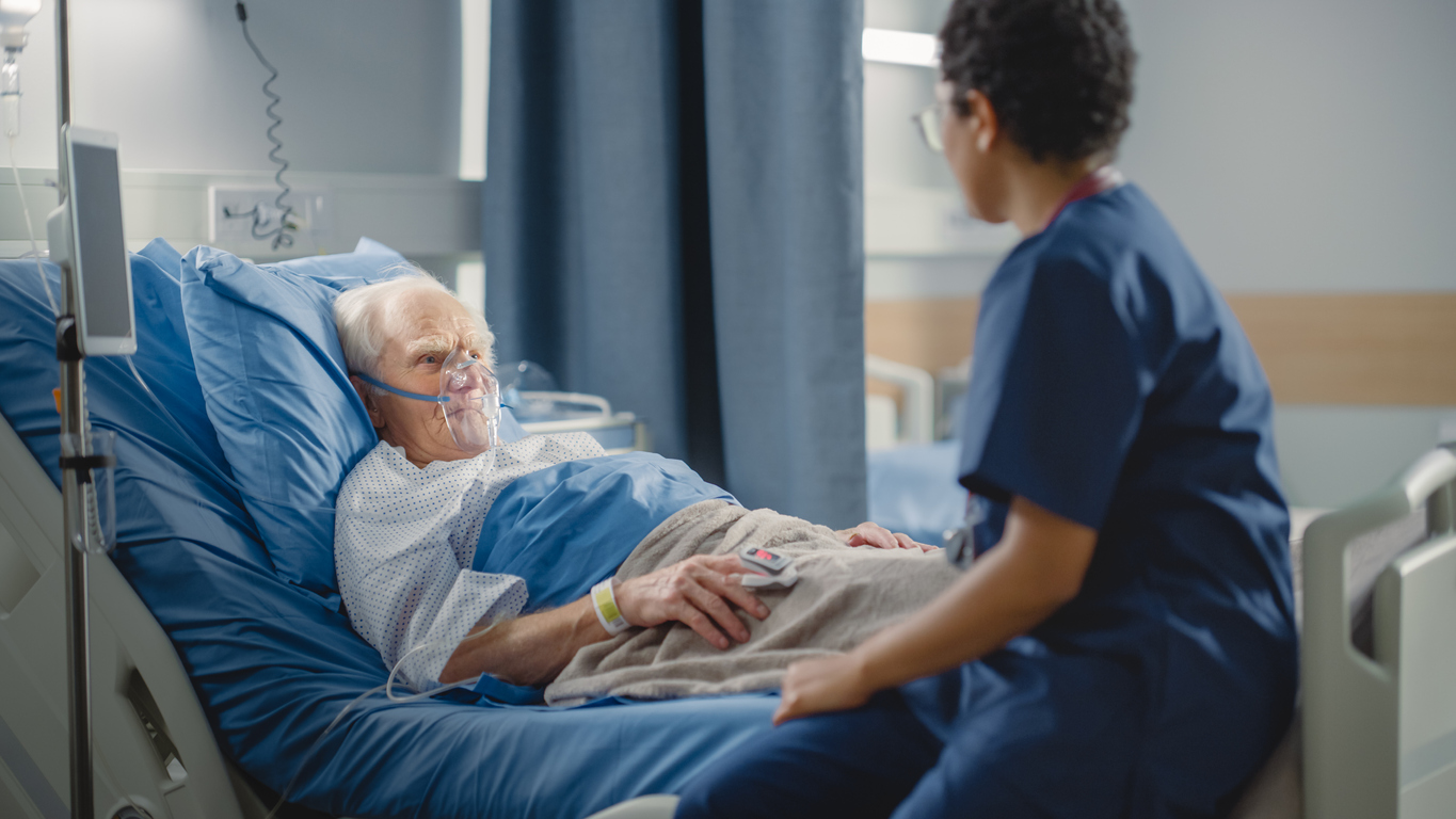 Senior on hospital bed