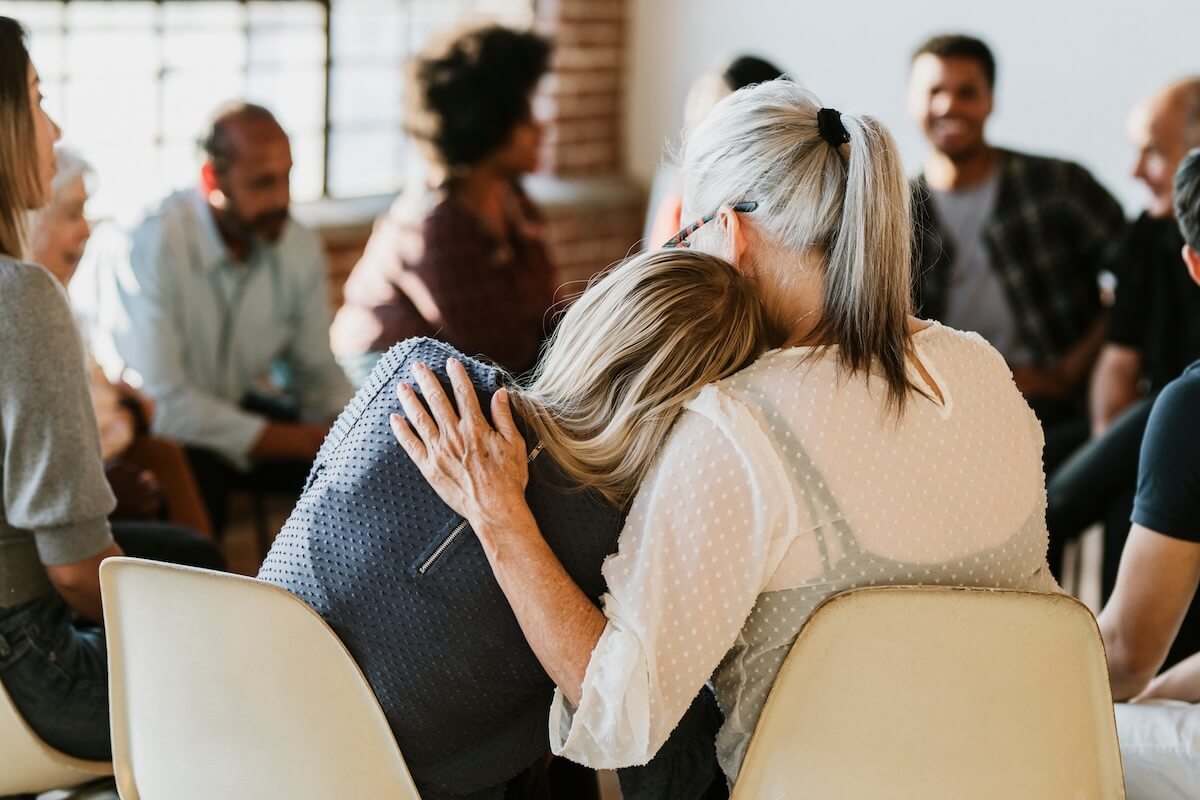 CalAIM: people at a group therapy session