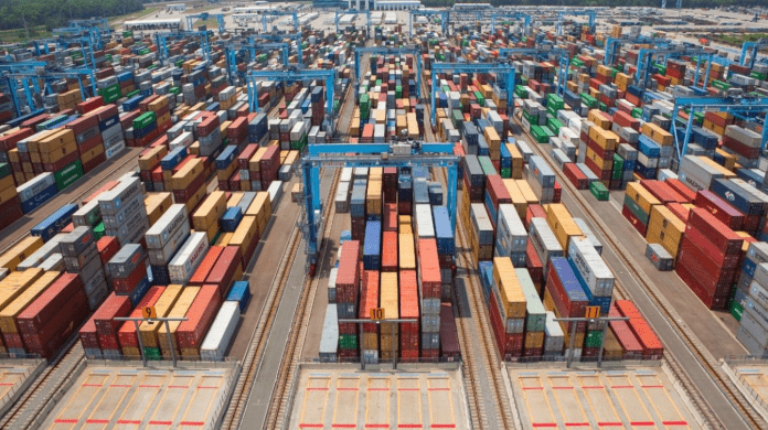 A large container yard with many containers

Description automatically generated with medium confidence