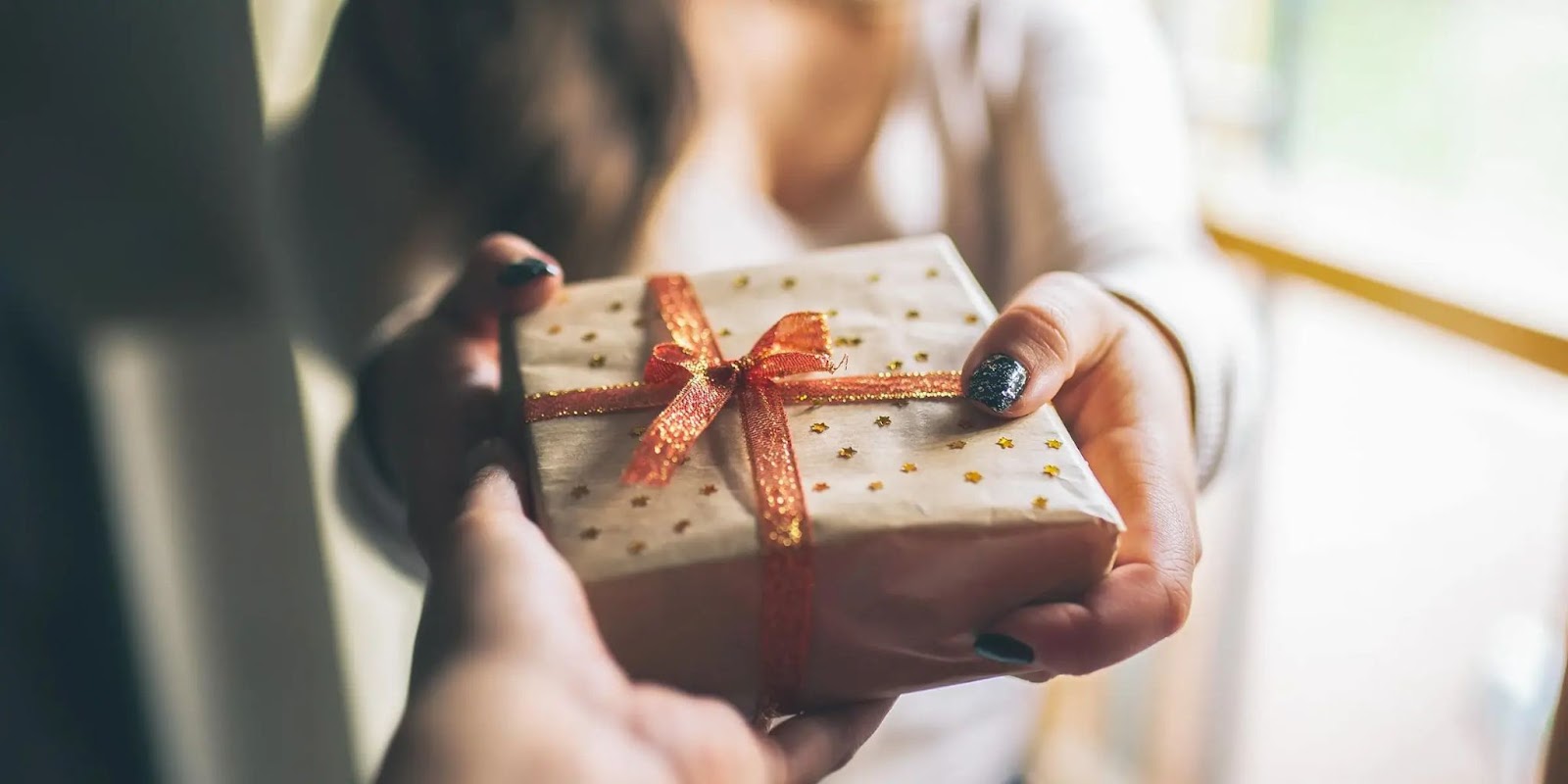 How can Giving Gifts on Valentine's Day Express Love in All Different Forms?