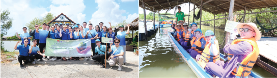 A group of people standing in a boatDescription automatically generated