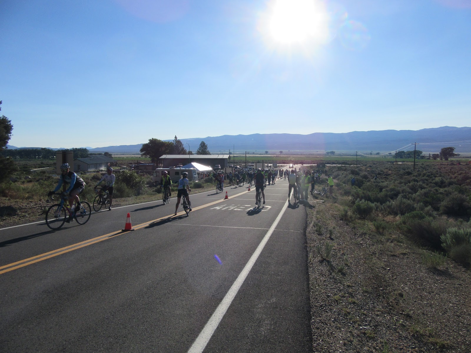Cyclists on bikes at the base of Monitor Pass east, start of climb #2 of death ride
