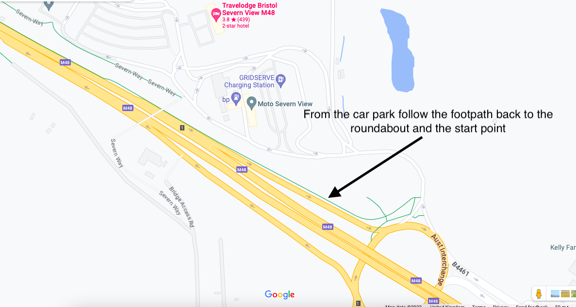 A map of a road with a black arrow

Description automatically generated