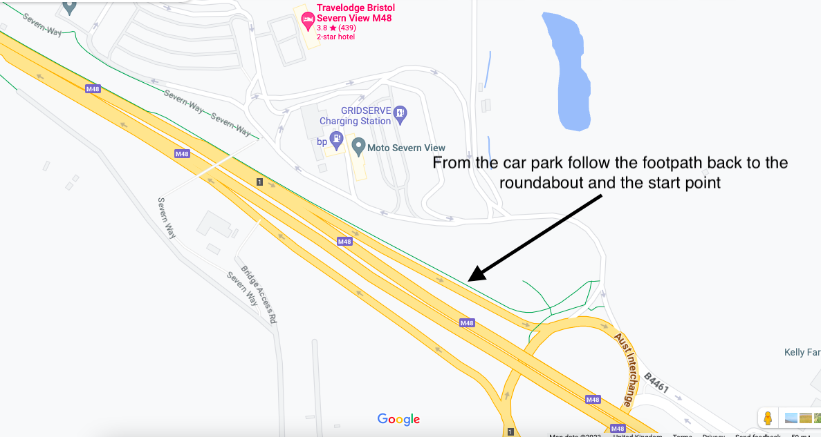 A map of a road with a black arrow
Description automatically generated