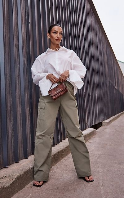 2024 Fashion trends: Picture of  a lady rocking a white shirt and cargo pants