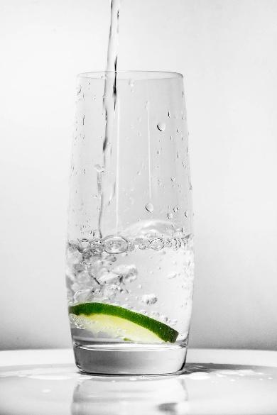 A glass of water being poured into a glass

Description automatically generated with medium confidence