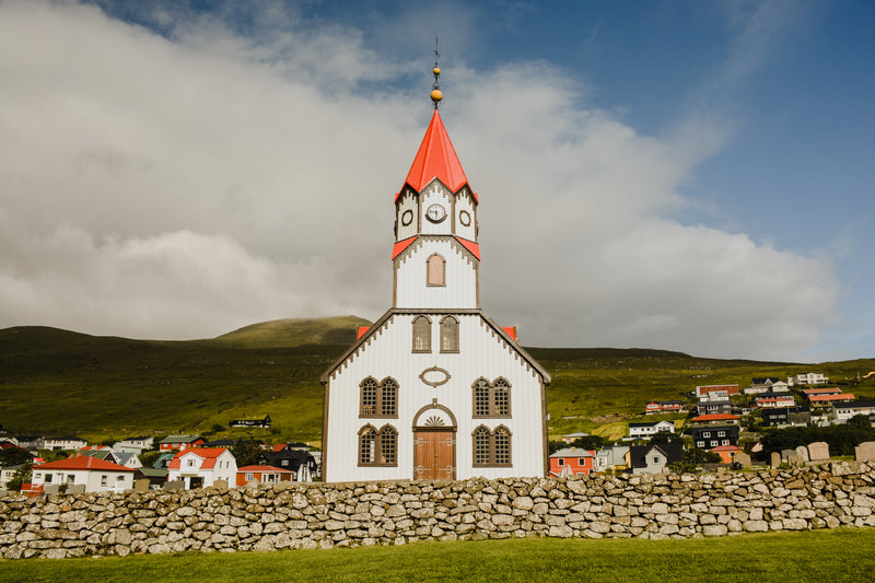 the church of sandavagur towers over the village houses - Image of Jewelry and Accessories, A series