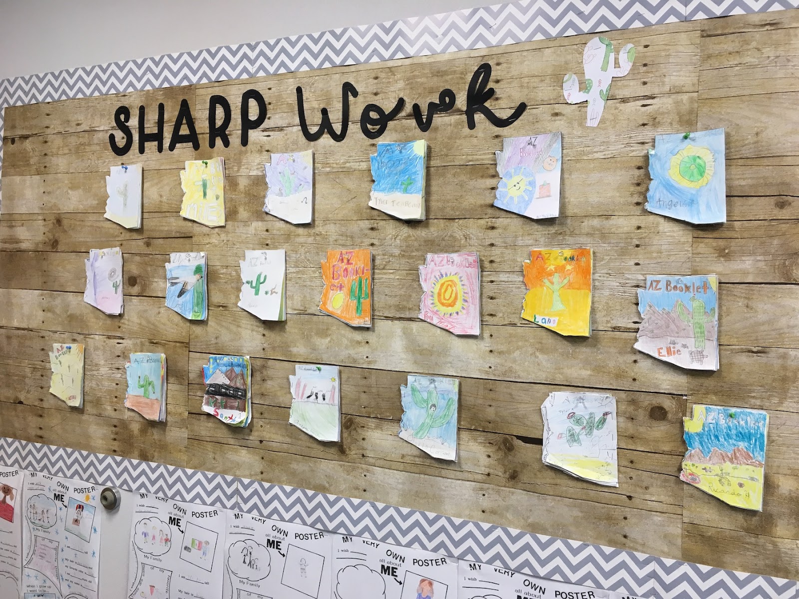 This image shows a bulletin board displaying student work. The title of the bulletin board reads "Sharp Work". 