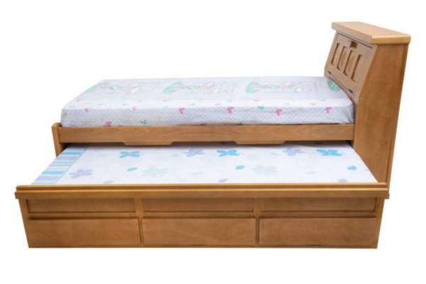 Brown wooden trundle bed frame with colorful mattress.