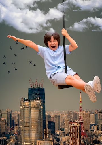 a giant little boy swinging around skyscrapers