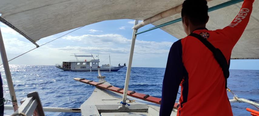 Photo Caption: Philippine Coast Guard (PCG)-District Southern Tagalog rescues eight passengers onboard a tourist boat in Occidental Mindoro on December 26.