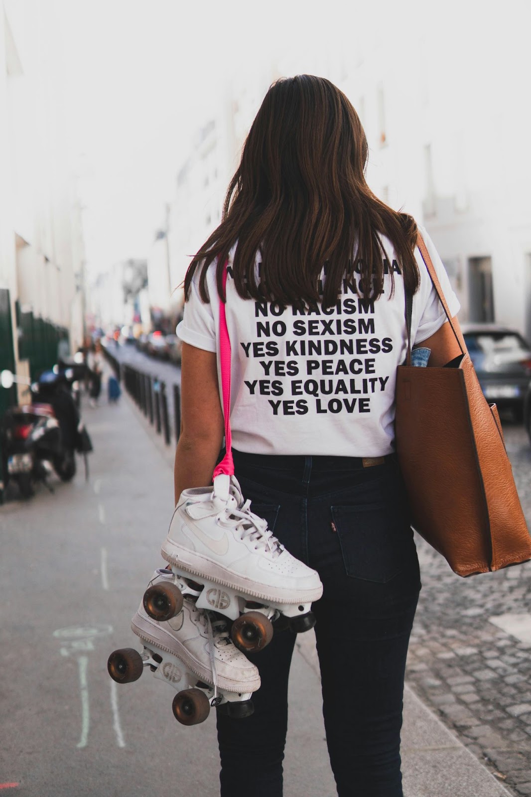 A female promoting equality, Photo by Jean-Baptiste Burbaud