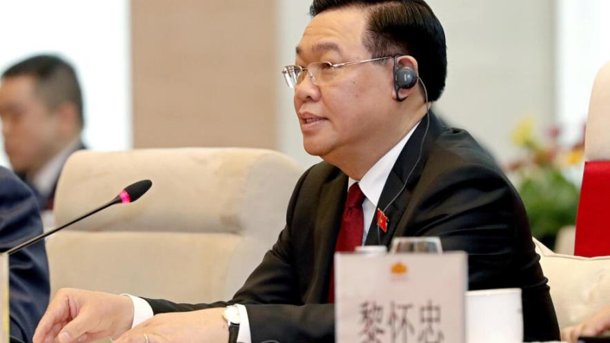 Vietnamese Chairman of the National Assembly Vuong Dinh Hue speaks to Chinese President Xi Jinping during a meeting at the national assembly in Hanoi, Vietnam, Wednesday, Dec. 13, 2023.