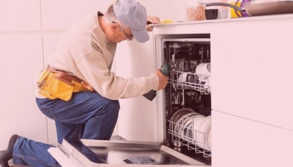 Professional technician diagnosing the issue with the dishwasher