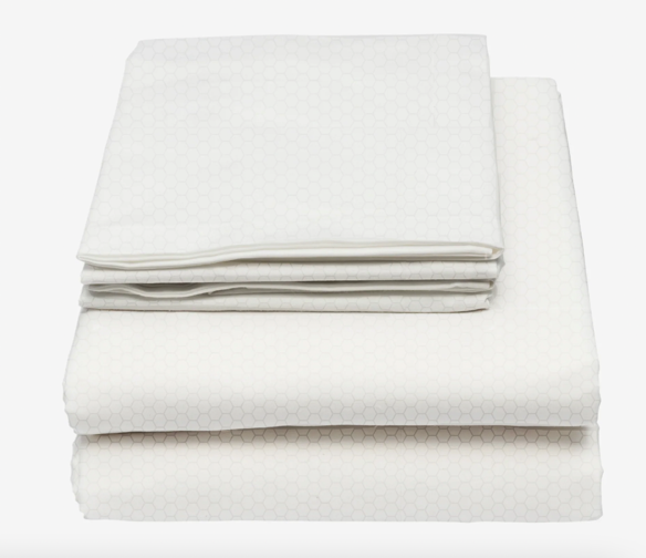 A stack of white sheets

Description automatically generated