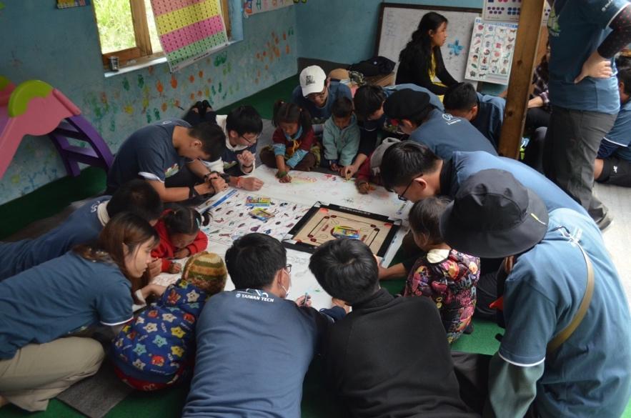 The Taiwan Tech team's interaction with local elementary school children in Pisang
